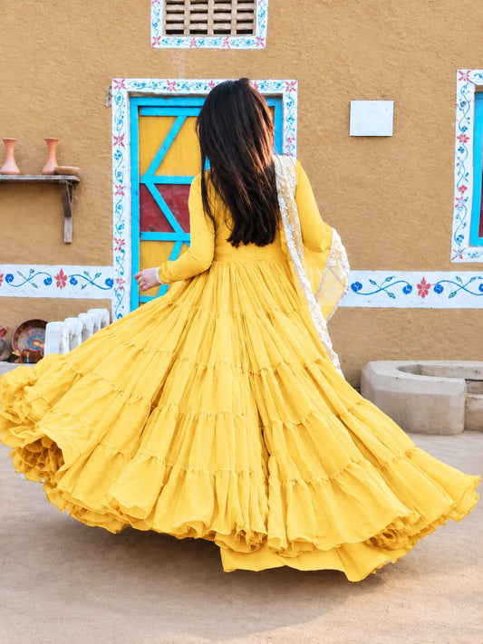 Back view of Leela Yellow chiffon step frock with wide layered flare by Anabiyawear