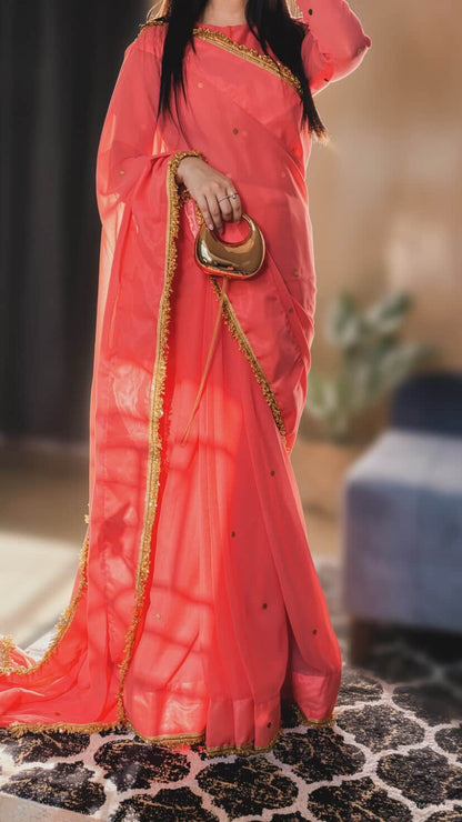 Rosabelle – Coral Pink Chiffon Saree with Golden Lace