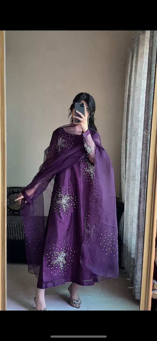 Gulshan Purple three piece organza outfit showing the long shirt, matching dupatta and detailed purple formal styling