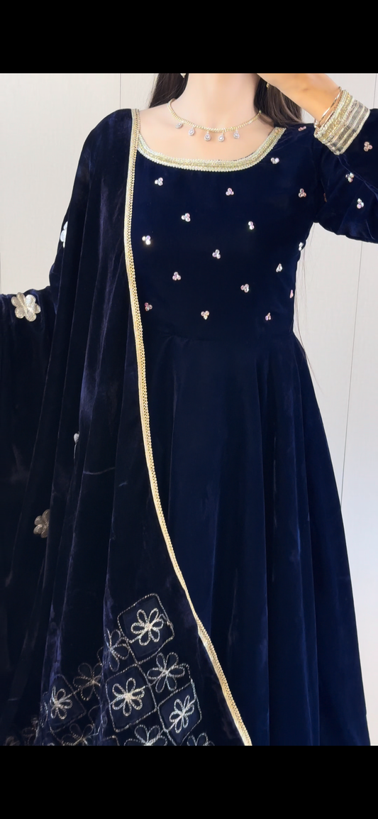Close detail of Afreen navy velvet maxi showing rhinestone neckline accents and contrasting velvet shawl border