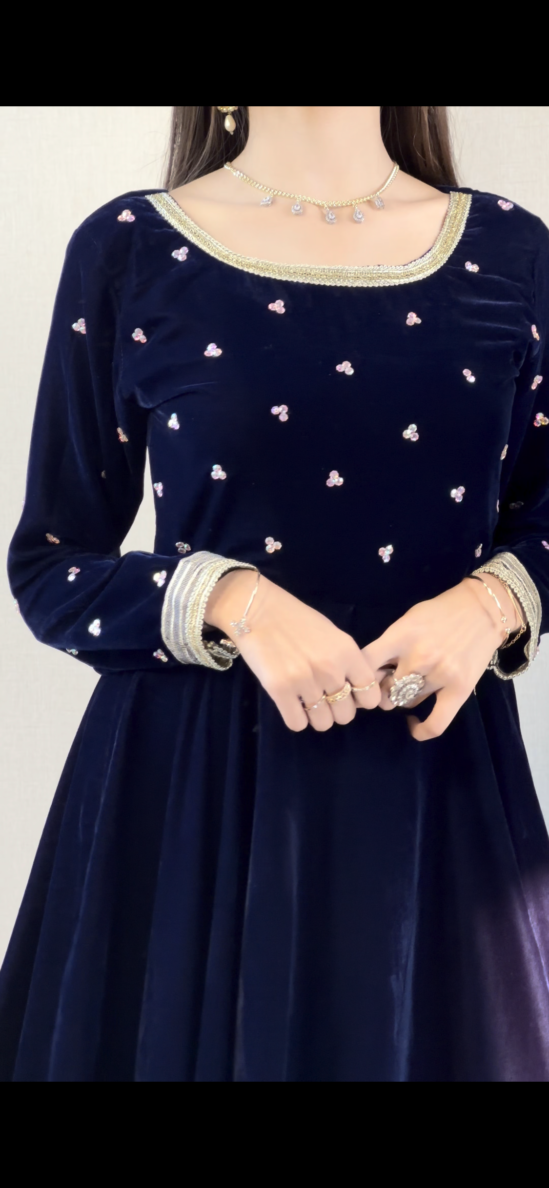 Afreen navy Micro 9000 velvet maxi showing scattered rhinestone work across the bodice and long sleeves