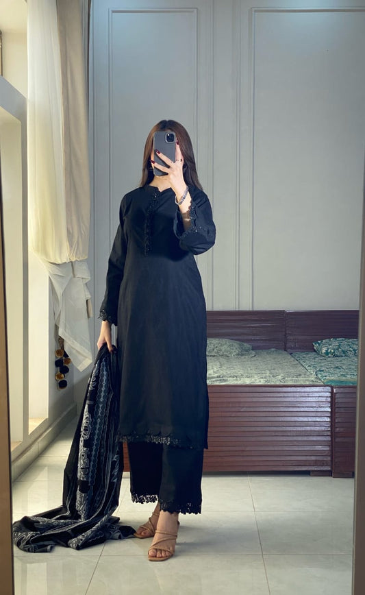 Black Aura black lawn three piece suit in front standing pose with straight shirt, matching trouser and jacquard dupatta
