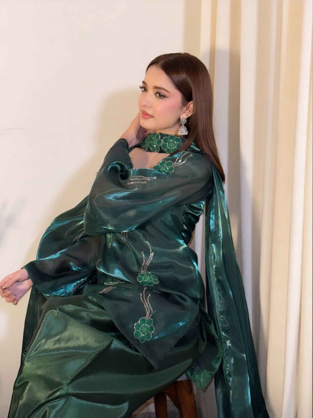 Emerald festive attire featuring an embroidered high neckline and statement sleeves from Anabiyawear
