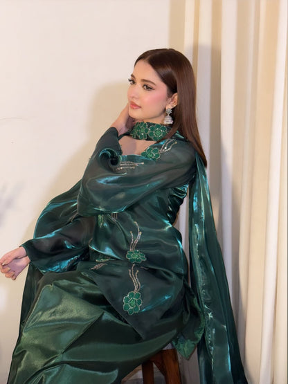 Emerald festive attire featuring an embroidered high neckline and statement sleeves from Anabiyawear