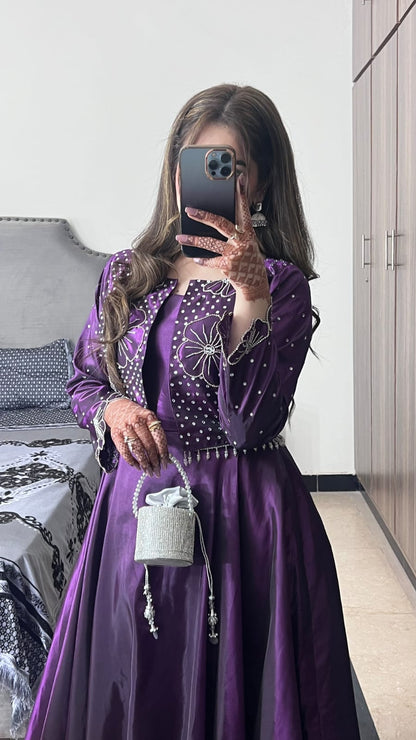 Flora Plum Katan silk frock styled with an embellished jacket, silver detailing and a flowing plum skirt