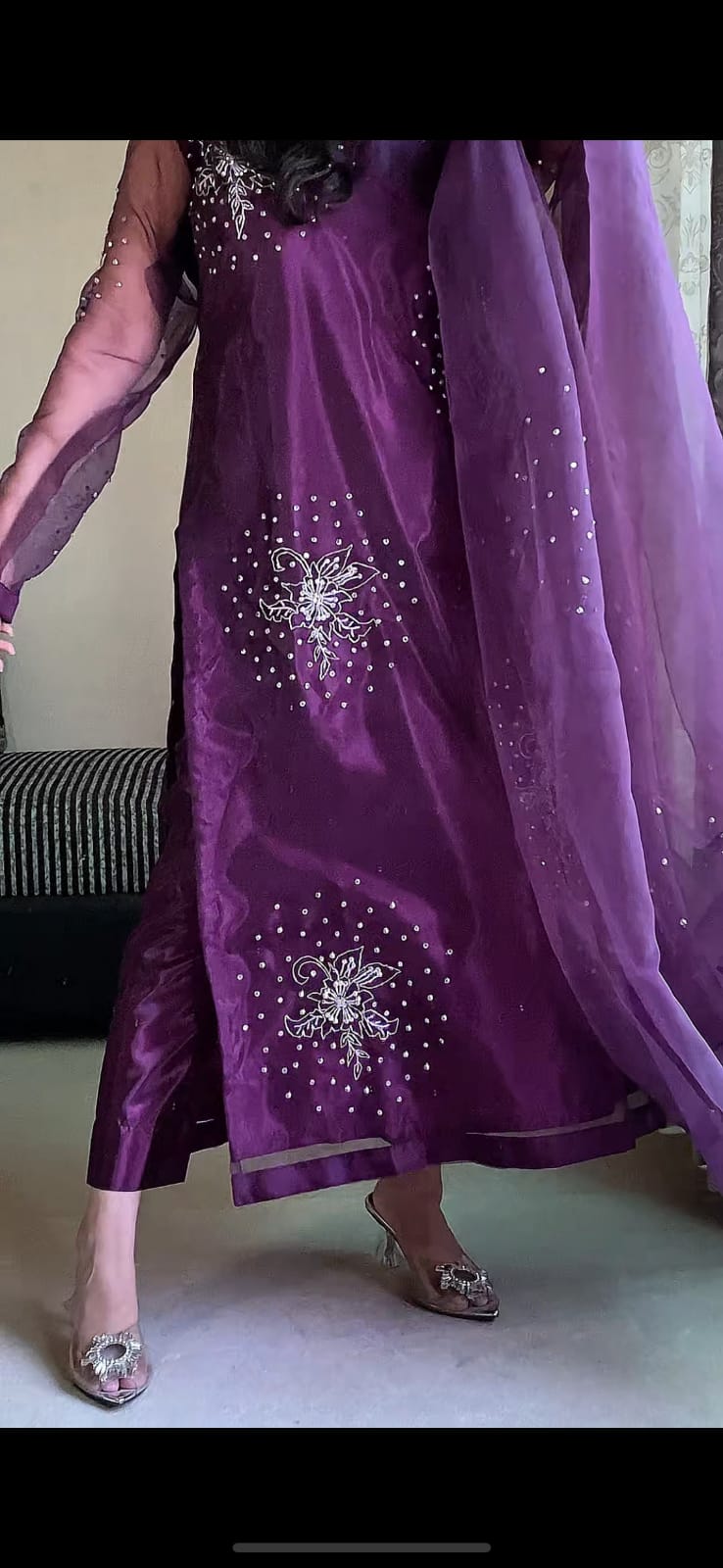 Close view of Gulshan Purple organza long shirt highlighting lower front embellishment, sequin accents and rich purple fabric