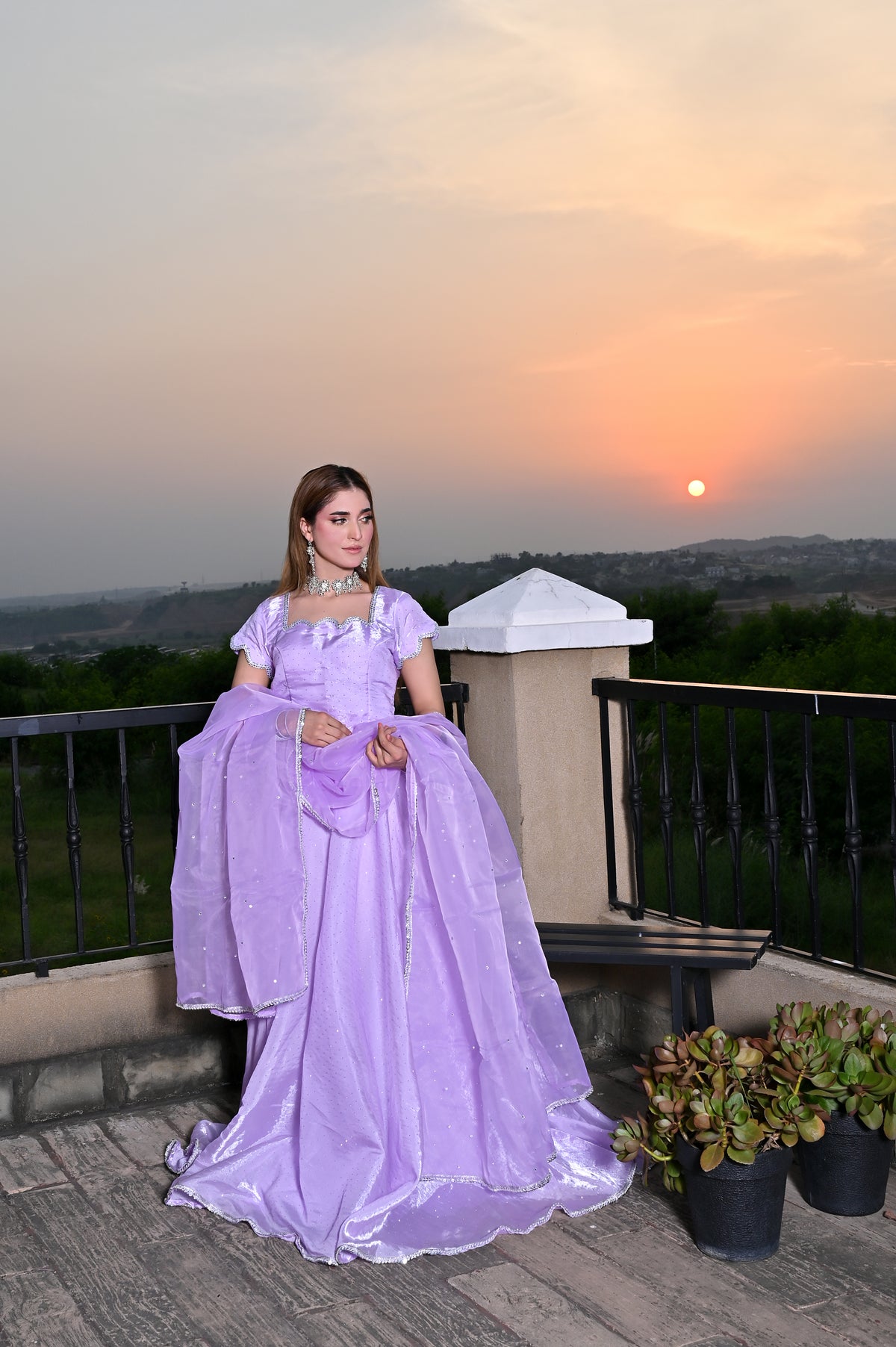 Lavender Glow Shesha silk lehenga styled with a soft net dupatta in an evening setting