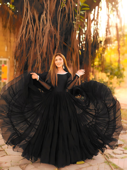 Leela Black step frock with full layered flare spread out
