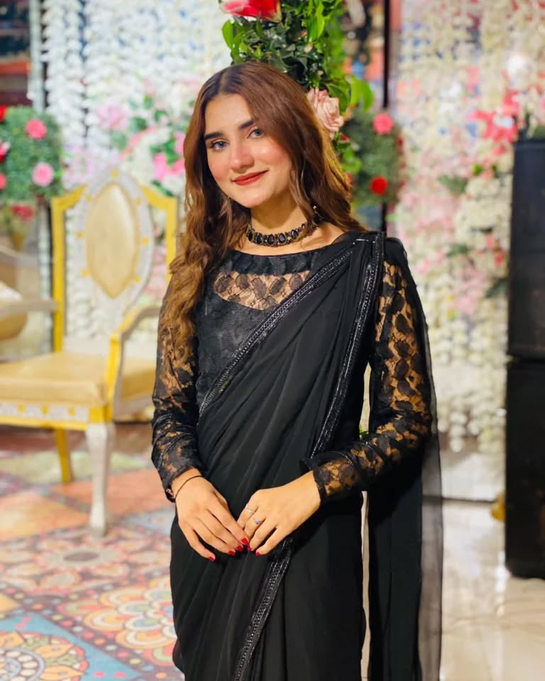 Close view of Lobelia black chiffon saree with sheer lace sleeves, net blouse and soft draped pallu