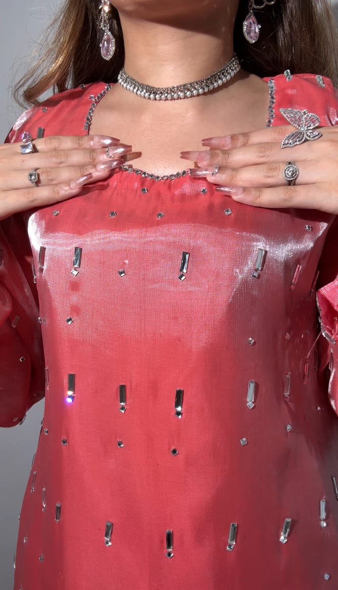 Mahveen Rose shisha silk shirt close view showing crystal stone embellishment across the front bodice and soft rose pink fabric