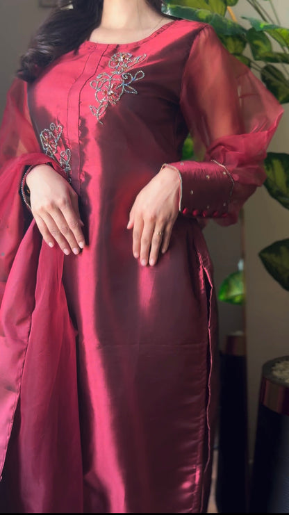Murraya Maroon China katan silk shirt showing maroon crystal motif work, embellished sleeves and smooth formal fabric finish