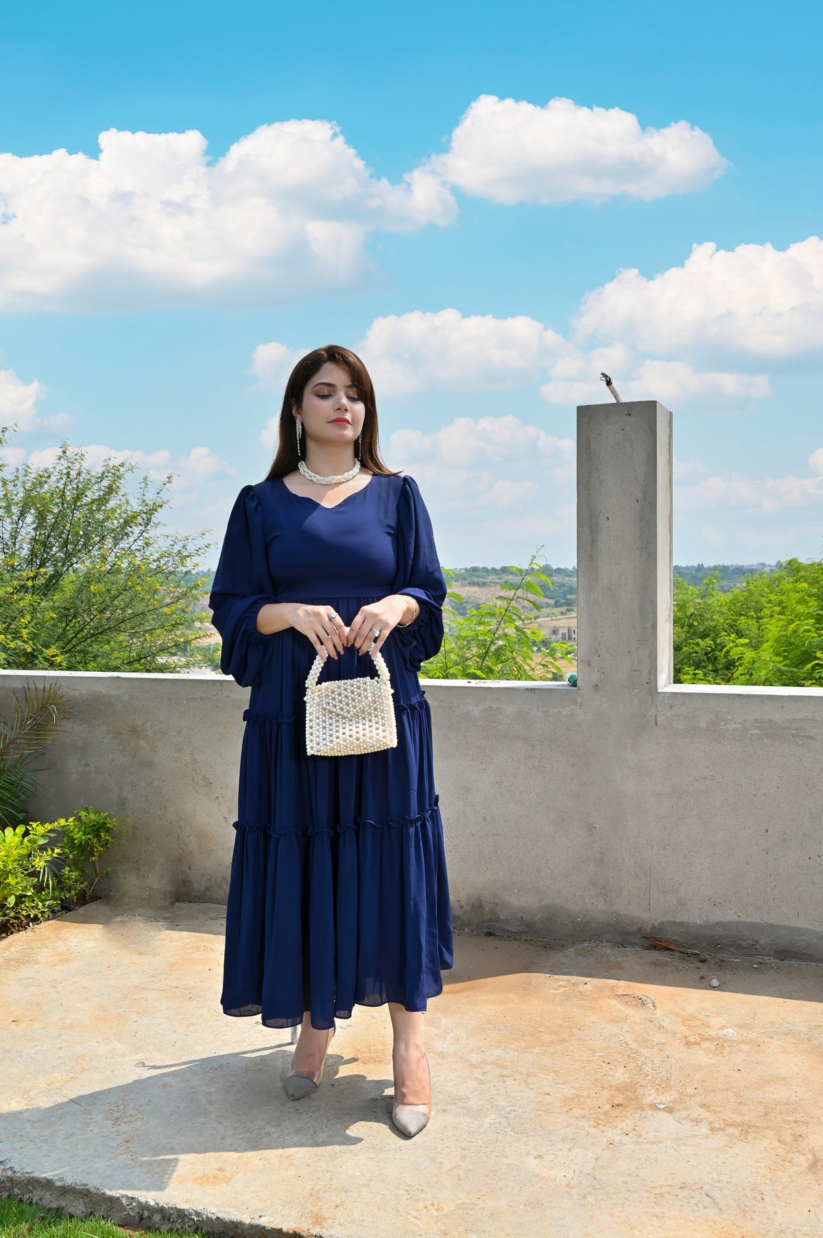 Full view of Ocean Muse navy blue georgette step frock with tiered flare