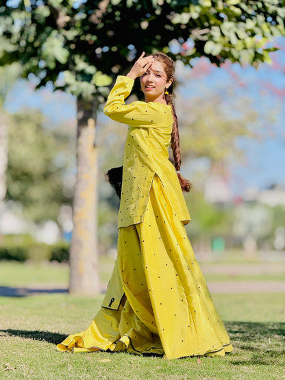 Primrose yellow kalidar lehenga set in standing pose with embroidered dupatta by Anabiyawear