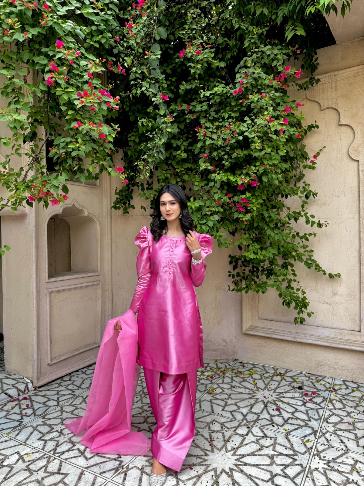Rose Pink China Katan farshi 3 piece in a full-length garden pose with fluffy sleeves, farshi trouser and flowing organza dupatta