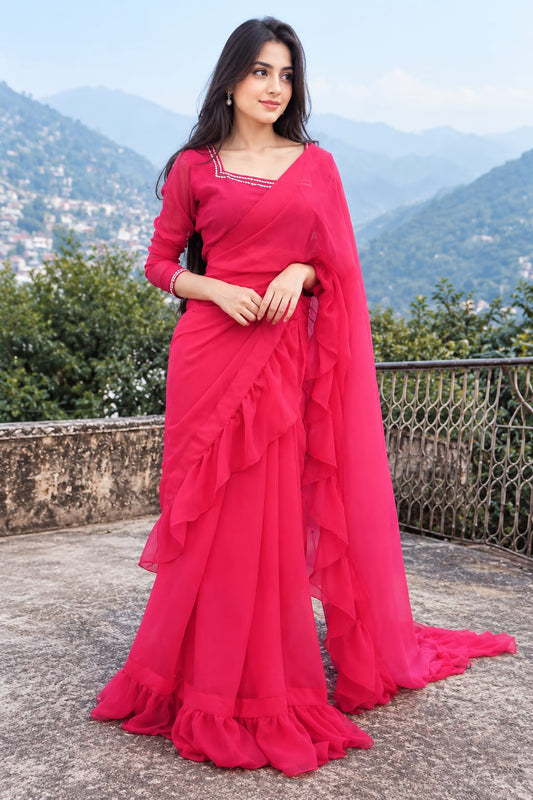 Ruffle Bloom pink chiffon saree in a terrace pose with layered ruffle drape, fitted blouse and flowing formal silhouette