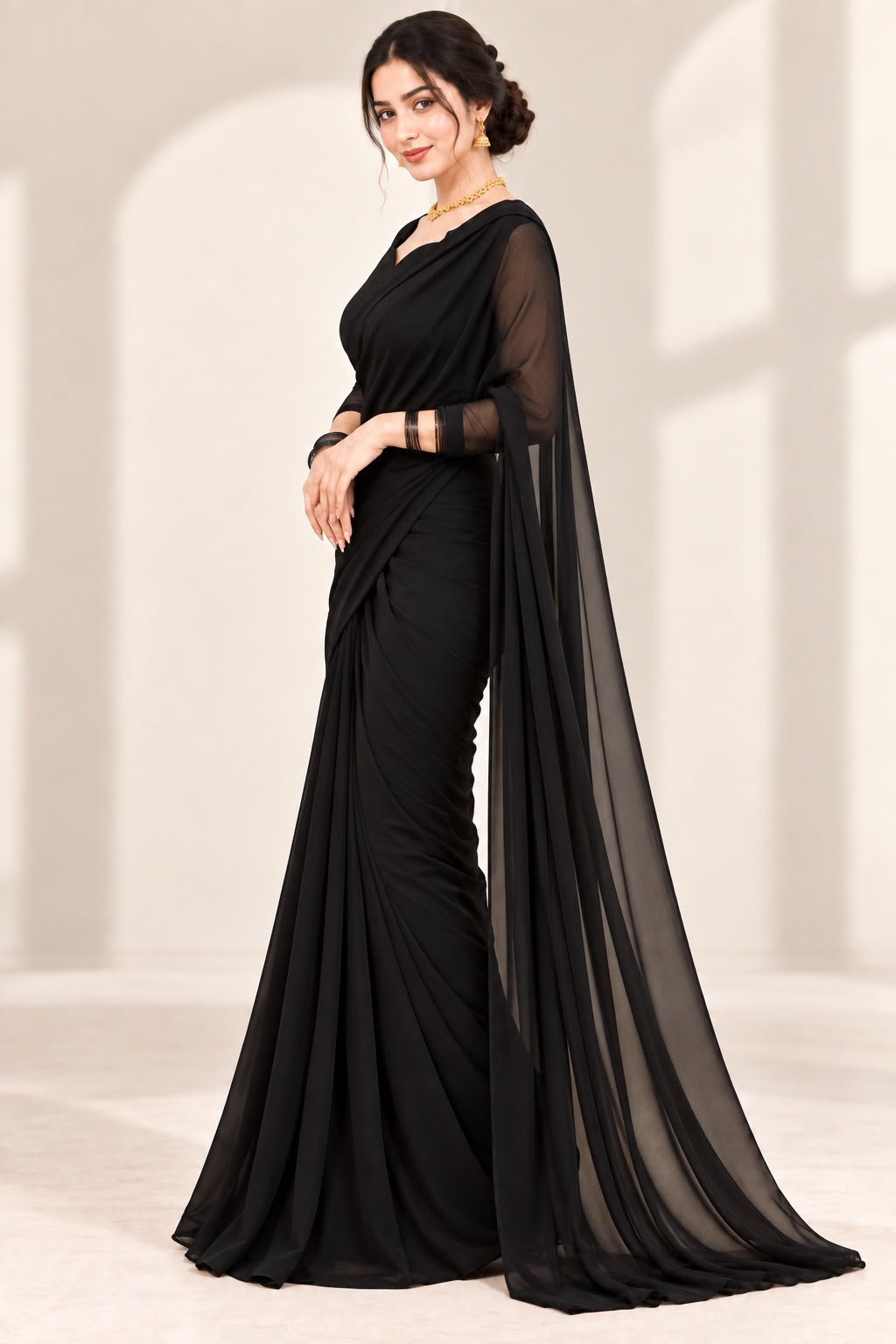 Shab Aara black chiffon saree with cutwork blouse by Anabiyawear