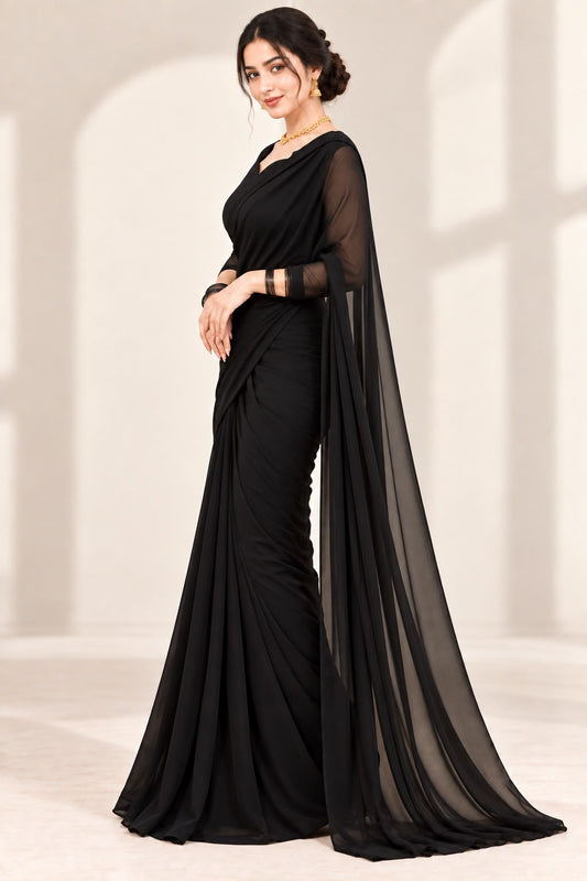 Shab Aara black chiffon saree with cutwork blouse by Anabiyawear