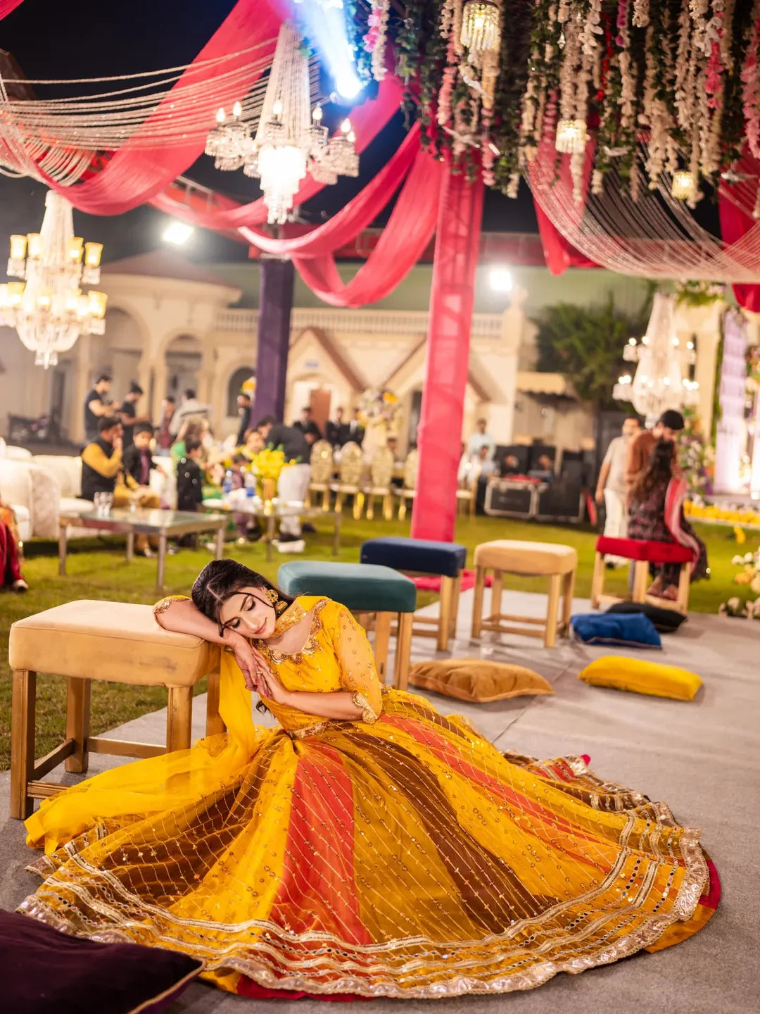Wide seated view of Signature Mehndi Kali Dar Lehenga Kurti with flared multicolor lehenga