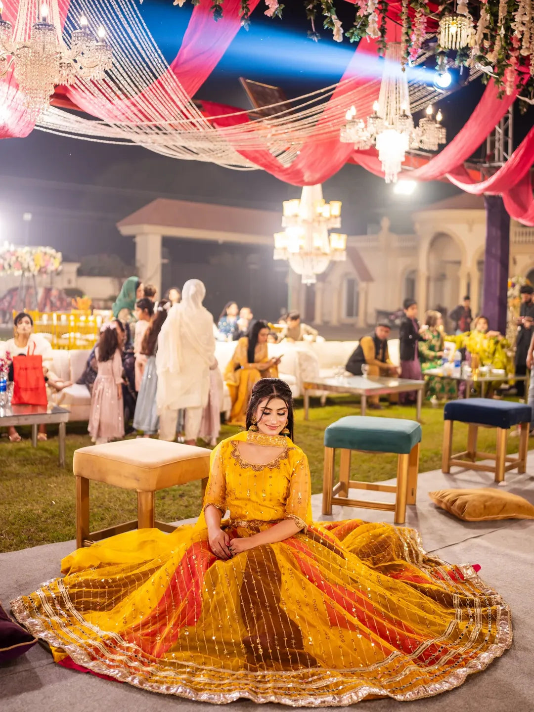Wide seated view of Signature Mehndi Kali Dar Lehenga Kurti with flared multicolor lehenga