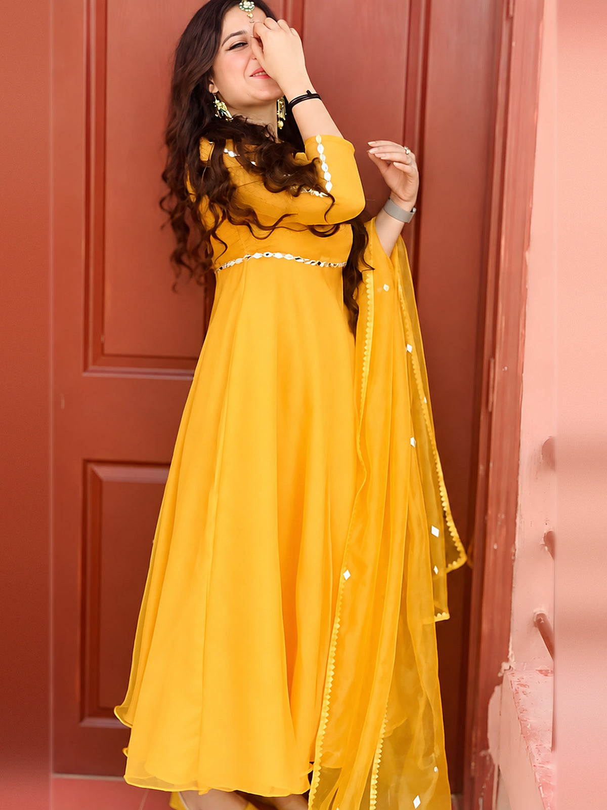 Umbrella Mirror Yellow frock side pose showing mirror work on sleeves and waist