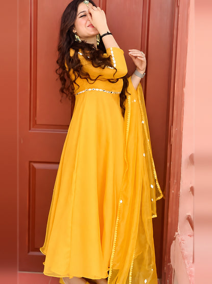 Umbrella Mirror Yellow frock side pose showing mirror work on sleeves and waist