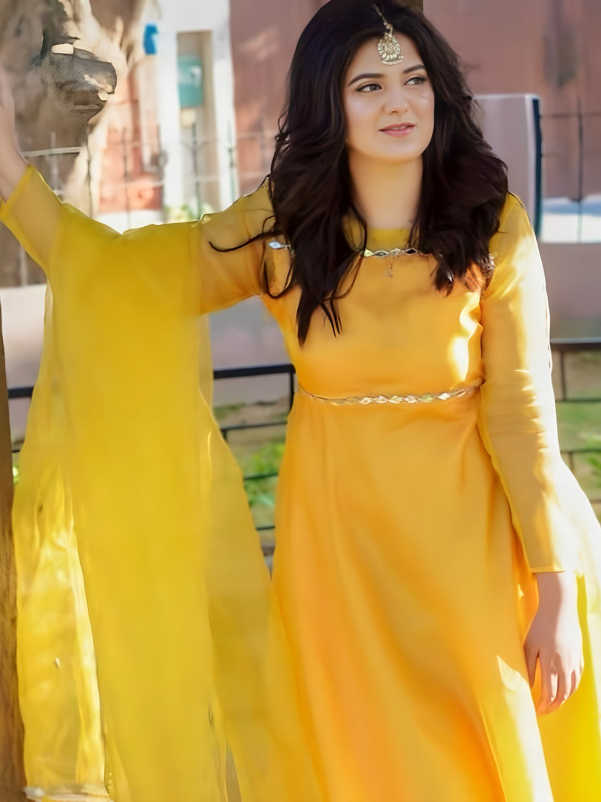 Umbrella Mirror Yellow frock close-up of mirror work neckline and waistline