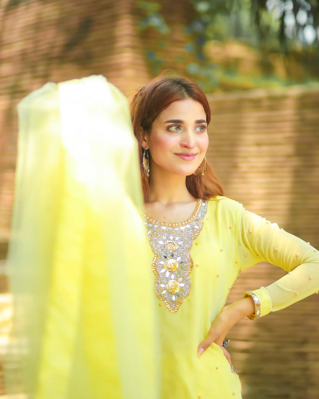 Zari Lemon chiffon sharara set portrait showing mirror work neckline and soft net dupatta by Anabiyawear